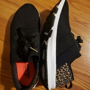 New Balance size 6.5 Black Tennis Shoes with leopard detail on back